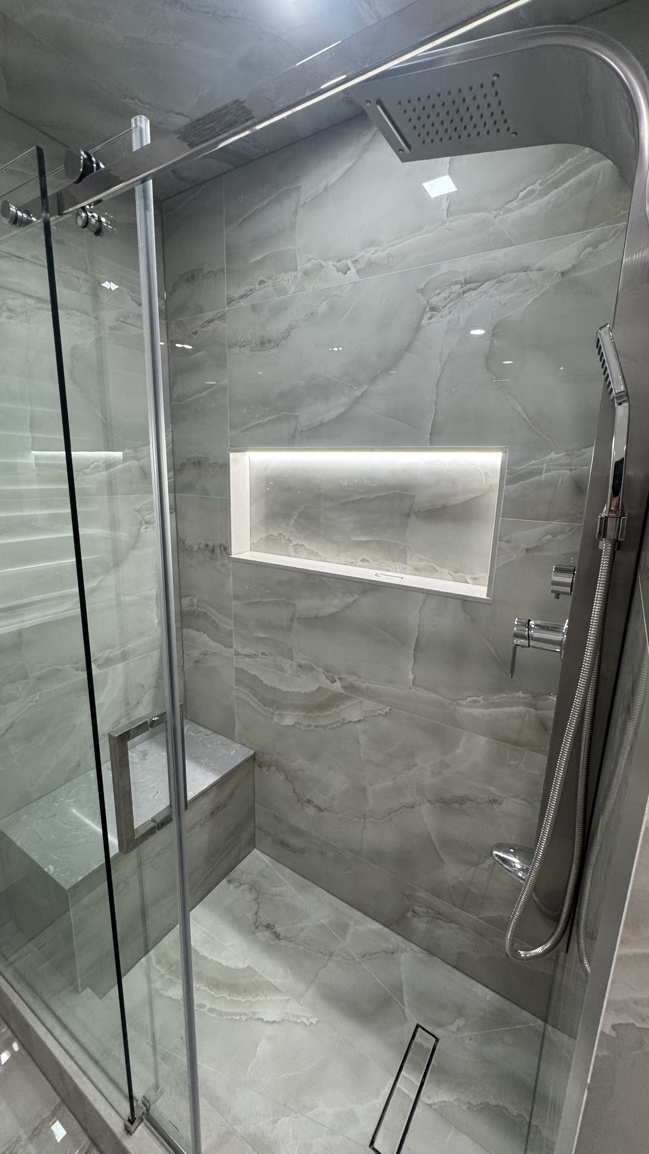 Master washroom glass shower renovation